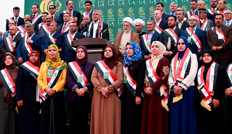 Candidates for Parliament holding a campaign rally in Baghdad, Iraq, Monday, May 7, 2018. Iraqis head to the polls next weekend for the first time since the government declared victory against the Islamic State group, in national elections that could tilt the balance of power between the United States and Iran.