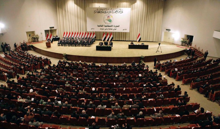 The Iraqi Parliament sits to approve a new government in Baghdad, Iraq, Tuesday, Dec. 21, 2010. 