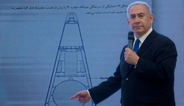 Israeli Prime Minister Benjamin Netanyahu presents material on Iranian nuclear weapons development during a press conference in Tel Aviv, Monday, April 30 2018. Netanyahu says his government has obtained "half a ton" of secret Iranian documents proving the Tehran government once had a nuclear weapons program. Calling it a "great intelligence achievement," Netanyahu said Monday that the documents show that Iran lied about its nuclear ambitions before signing a 2015 deal with world powers.