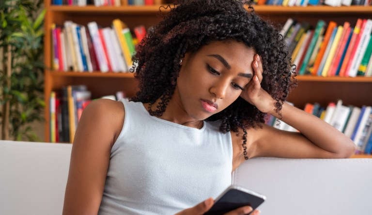 Millennial woman feeling anxious and depressed.