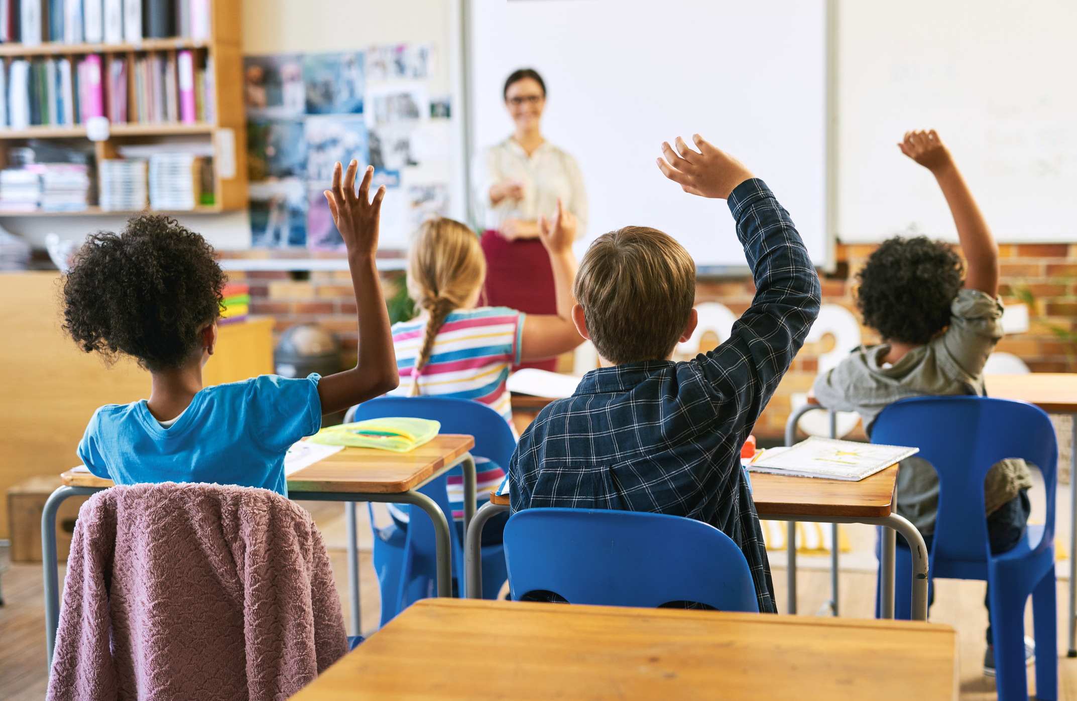 Kansas school settles with teacher suspended over pronoun use for $95K