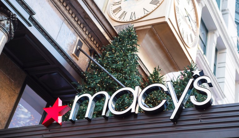 New York, New York, â Nov. 17, 2012: The new Macy's sign on the recently renovated roof overhang on the main Broadway entrance of Macy's Herald Square flagship store.