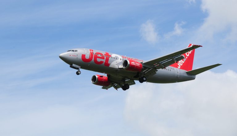  Jet2, a British budget company, flying a commercial Boeing 737-300 jet in the United Kingdom.