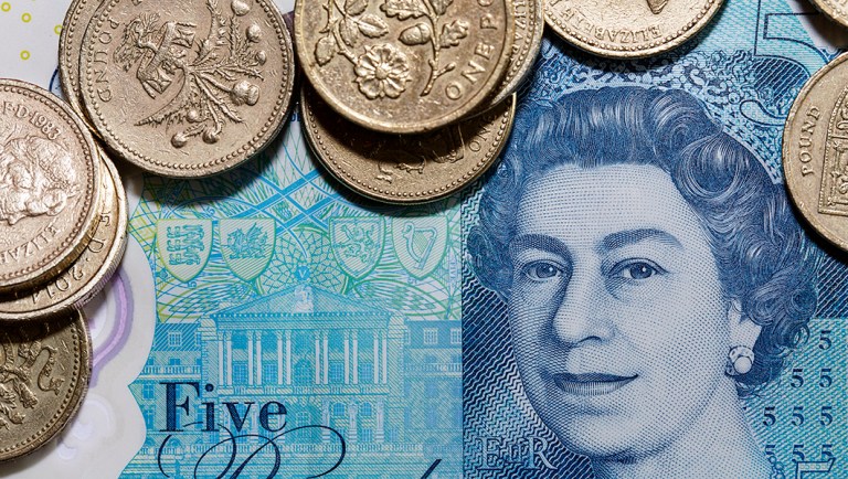 A British five-pound note.