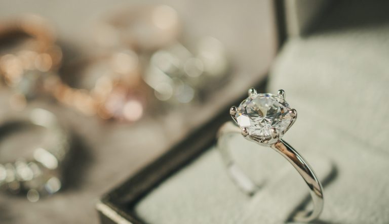 Luxury engagement Diamond ring in jewelry gift box.