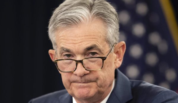 Fed holds target steady and says no rate cuts until confident inflation is defeated