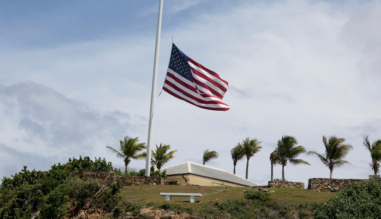 A U.S. flag flies at half staff on Little St. James Island, in the U. S. Virgin Islands, a property owned by Jeffrey Epstein, Wednesday, Aug. 14, 2019.