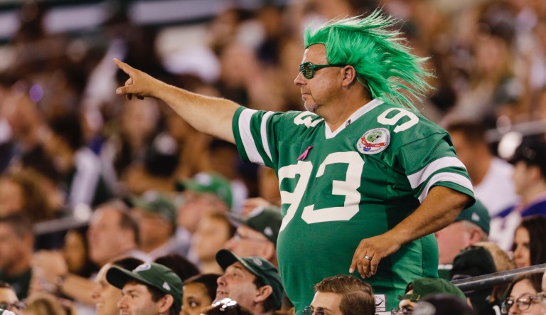 A New York Jets fan gestures to a play being called back during the second half of a preseason NFL football game against the New Orleans Saints Saturday, Aug. 24, 2019, in East Rutherford, N.J. 