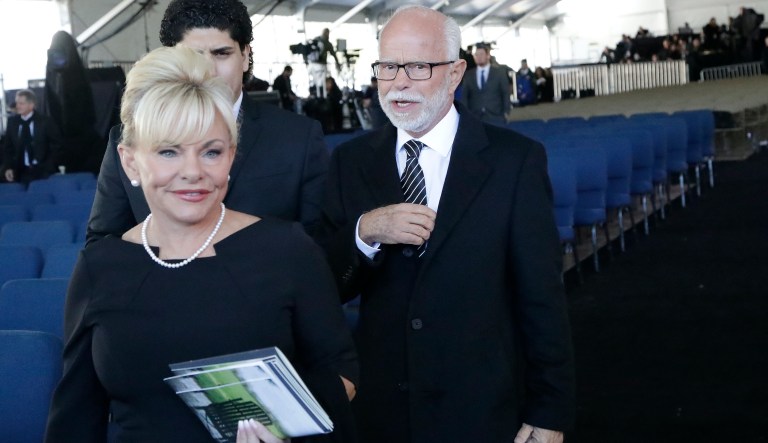 Televangelist Jim Bakker, right, walks with his wife Lori Beth Graham after a funeral service at  the Billy Graham Library for the Rev. Billy Graham, who died last week at age 99, Friday, March 2, 2018, in Charlotte, N.C.