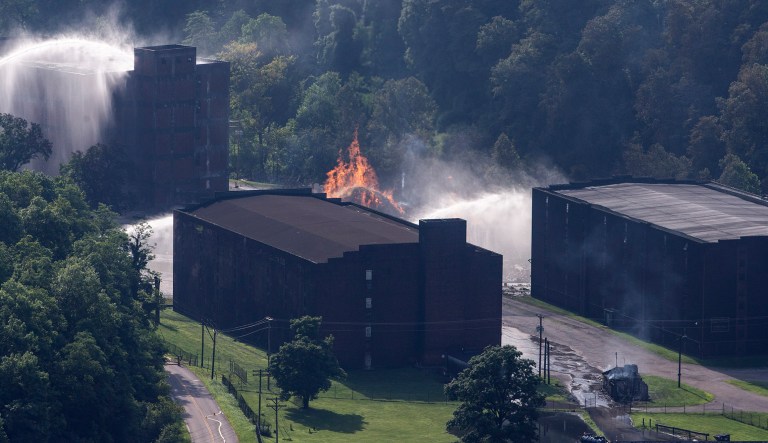 Flames and smoke rise from a  bourbon warehouse fire at a Jim Beam distillery in Woodford County, Ky., Wednesday, July 3, 2019. Firefighters from four counties responded to the blaze that erupted late Tuesday.