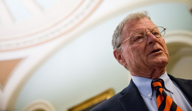 Sen. Jim Inhofe, R-Okla. speaks to a reporter as he arrives for a Senate policy luncheon on Capitol Hill in Washington, Tuesday, June 2, 2015, as legislation to end the National Security Agency's collection of Americans' calling records while preserving other surveillance authorities is expected to clear the Senate late Tuesday. But House leaders have warned their Senate counterparts not to proceed with planned changes to a House version.