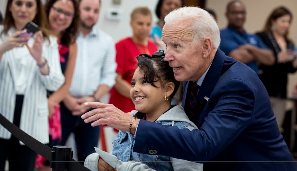 Biden places hands on girl, 10, and tells her: ‘You’re good-looking’
