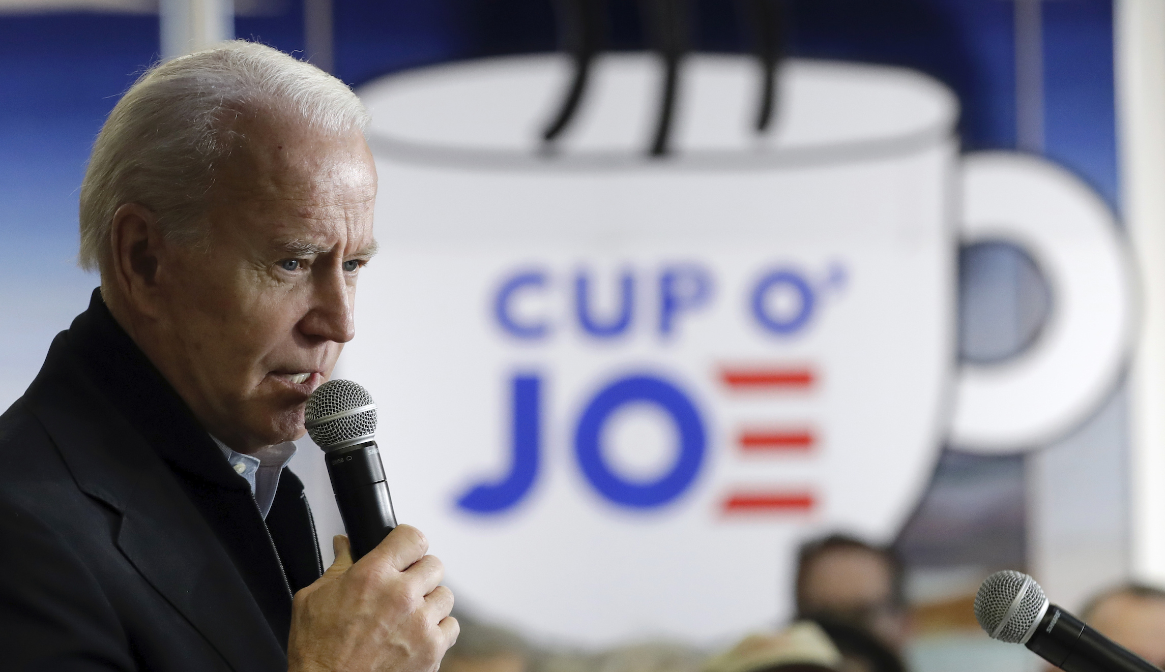 ‘Go vote for someone else’:  Biden confronted by climate activist he assumes supports Bernie Sanders