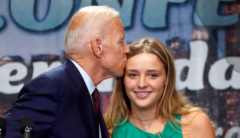 Joe Biden kisses his granddaughter Finnegan Biden, Friday, June 28, 2019, in Chicago. 