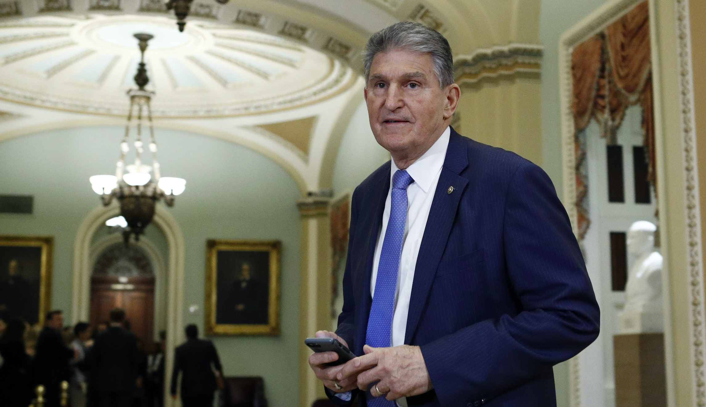 Manchin forces Democrats to hit the brakes, but he’s not in the driver’s seat