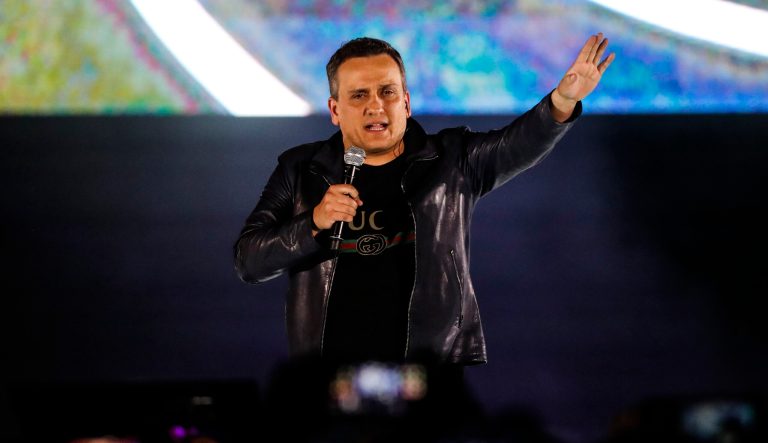 Film director Joe Russo waves to fans during Marvel's Avengers: Infinity War red carpet fan event in Singapore, Monday, April 16, 2018. 