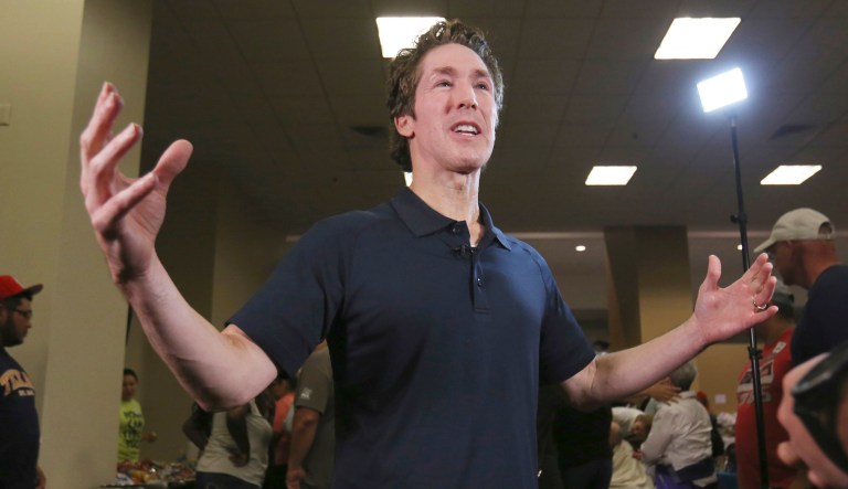 Pastor Joel Osteen gives an interview at his Lakewood Church in Houston, Texas, Tuesday, Aug. 29, 2017. Osteen and his congregation have set up their church as a shelter for evacuees from the flooding by Tropical Storm Harvey.