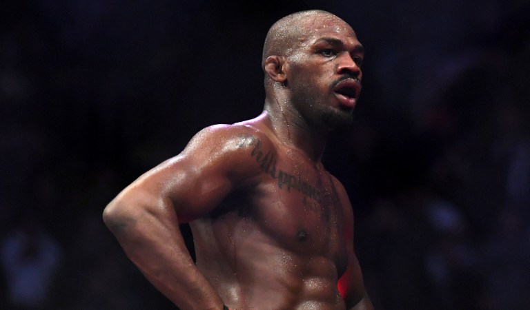 Jon Jones goes up on top of the octagon after defeating Alexander Gustafsson in the UFC Men's Light Heavyweight Title mixed martial arts bout at UFC 232, Saturday, Dec. 29, 2018, in Inglewood, Calif.