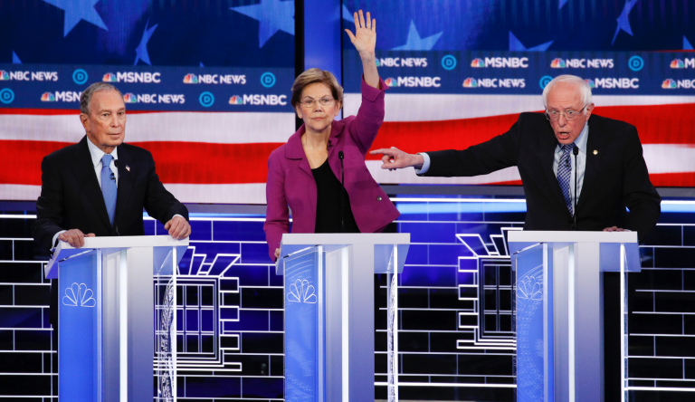 From left, Democratic presidential candidates, former New York City Mayor Mike Bloomberg, Sen. Elizabeth Warren, D-Mass., Sen. Bernie Sanders, I-Vt., participate in a Democratic presidential primary debate Wednesday, Feb. 19, 2020, in Las Vegas, hosted by NBC News and MSNBC. (AP Photo/John Locher)