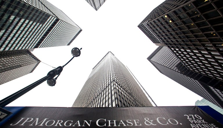Buildings on Park Avenue rise above a sign for the JP Morgan Chase & Co. headquarters in New York, U.S., on Friday, Sept. 26, 2008.