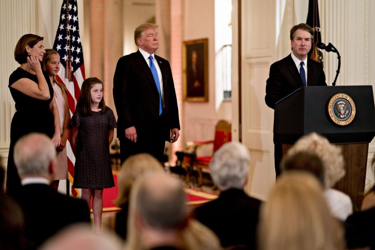 Brett Kavanaugh, appeals court judge, right, speaks after being nominated as an associate justice of the U.S. Supreme Court by U.S. President Donald Trump, center, as his wife Ashley Estes Kavanaugh, left, and daughters Margaret, second left, and Liza look on during a ceremony in the East Room of the White House in Washington, D.C., U.S., on Monday, July 9, 2018. TrumpÂ said he would nominate Kavanaugh for a seat on the U.S. Supreme Court, a choice that could create the most conservative court in generations and threaten landmark rulings including the Roe v. Wade abortion-rights decision.