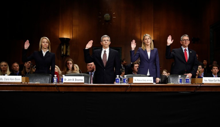 FILE - In this Nov. 15, 2017, file photo, four of President Donald Trumpâs nominees to be district court judges are sworn in to testify before the Senate Judiciary Committee, from left, Claria Horn Boom, John Broomes, Rebecca Grady Jennings, and Robert Earl Wier, are sworn in to testify during a Senate Judiciary Committee on Capitol Hill in Washington. If confirmed, the nominees are invited to attend a new judge training affectionately called Baby Judges School.