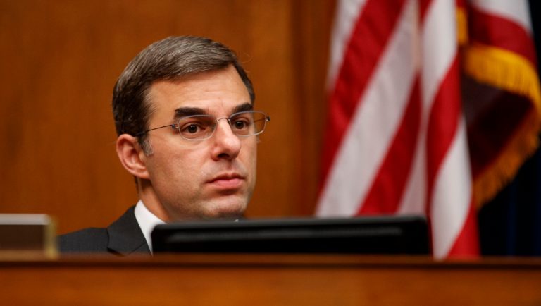 House Oversight and Reform National Security subcommittee member Rep. Justin Amash, R-Mich., looks out from the dais on Capitol Hill in Washington, Wednesday, May 22, 2019, during the House Oversight and Reform National Security subcommittee hearing on "Securing U.S. Election Infrastructure and Protecting Political Discourse." 