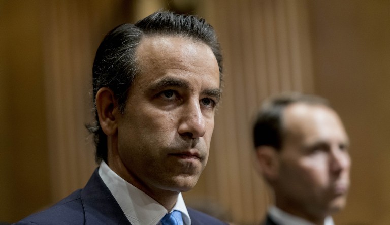 Senate advances Trump’s nominee for top Treasury position, who now faces hold over Russia Justin Muzinich, U.S. deputy Treasury secretary nominee for U.S. President Donald Trump, listens during a Senate Finance Committee confirmation hearing in Washington, D.C., U.S., on Thursday, July 26, 2018. Muzinich, a former Morgan Stanley banker and adviser to Jeb Bush's 2016 campaign who joined Steven Mnuchin's team in March as a counselor, helped craft the administration's tax-cut plan, a signature achievement of the president.