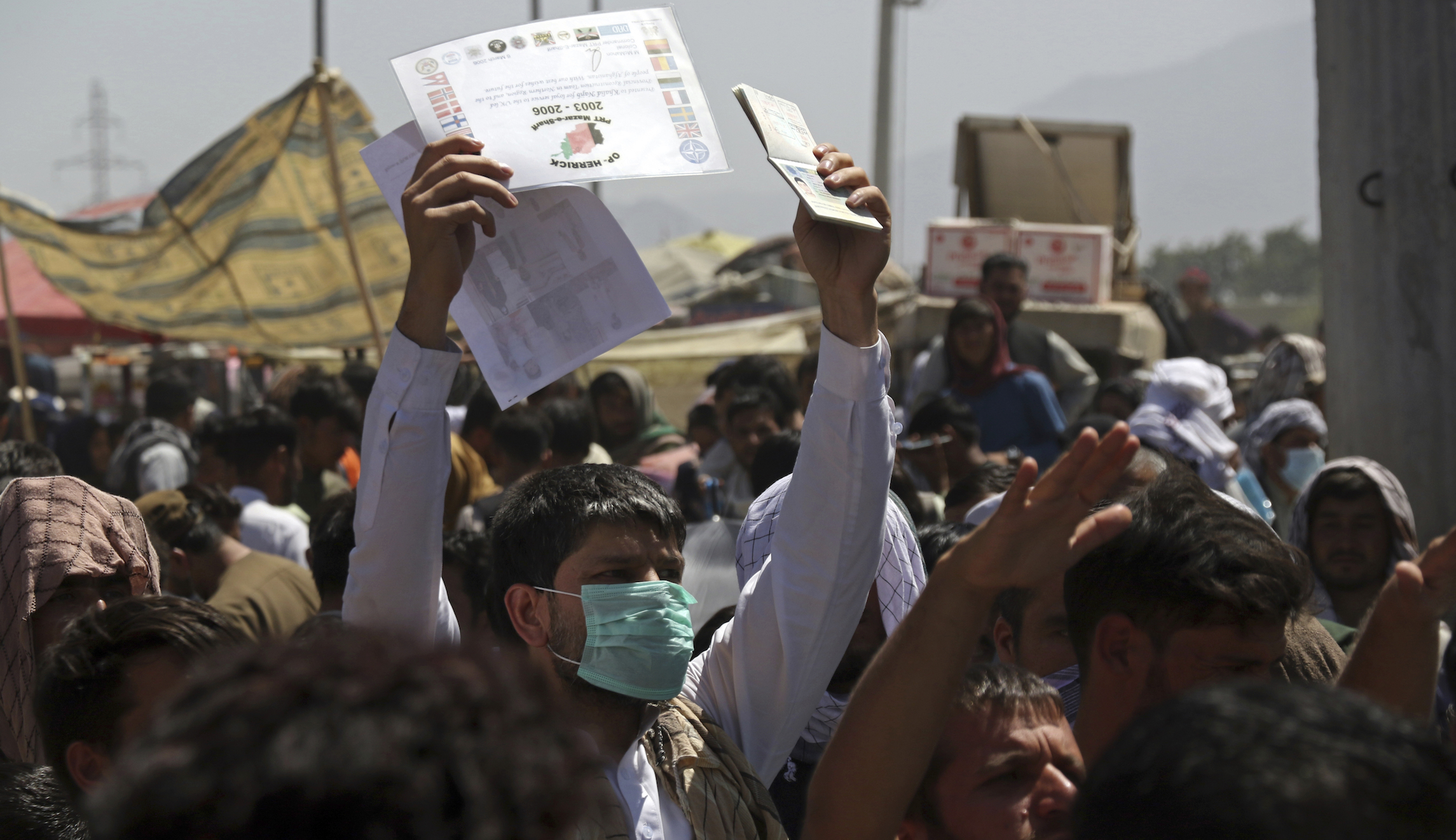 ‘Hunted’: Afghans left in limbo struggle to hide from Taliban and find US support