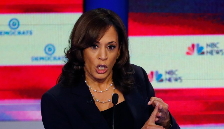Democratic presidential candidate Sen. Kamala Harris, D-Calif., gestures, during the Democratic primary debate hosted by NBC News at the Adrienne Arsht Center for the Performing Art, Thursday, June 27, 2019, in Miami.