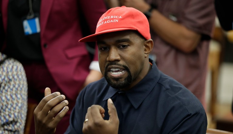 Rapper Kanye West speaks to President Donald Trump and others in the Oval Office of the White House, Thursday, Oct. 11, 2018, in Washington. 