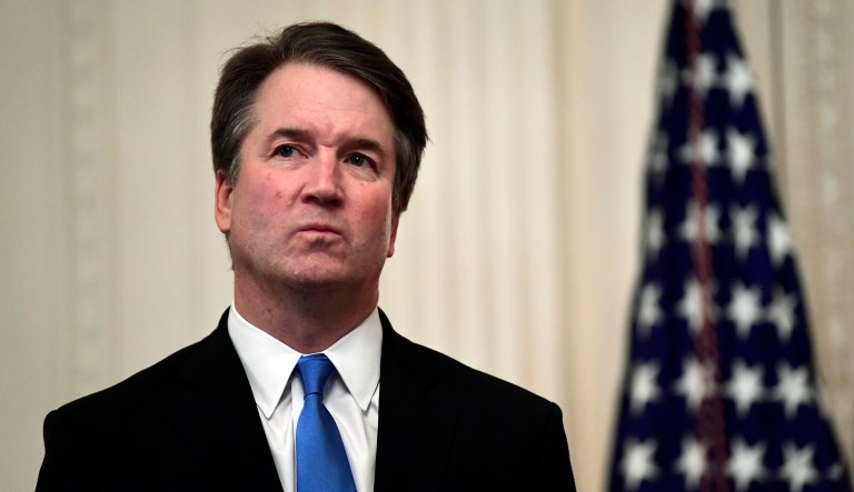 Supreme Court Justice Brett Kavanaugh stands before a ceremonial swearing-in in the East Room of the White House in Washington, Monday, Oct. 8, 2018.