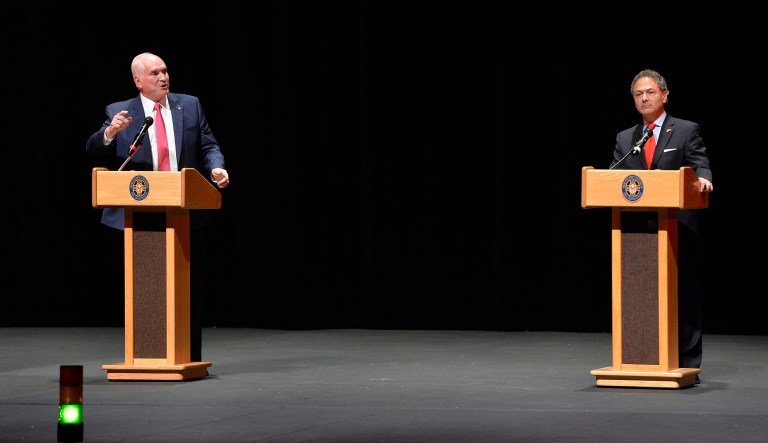 Republican nominee U.S. Rep. Mike Kelly, left, and Democratic nominee Ron DiNicola debate at the Mercyhurst University Mary D'Angelo Performing Arts Center in Erie, Pa., Monday, Oct. 8, 2018. The men are competing for the newly-formed 16th Congressional District.