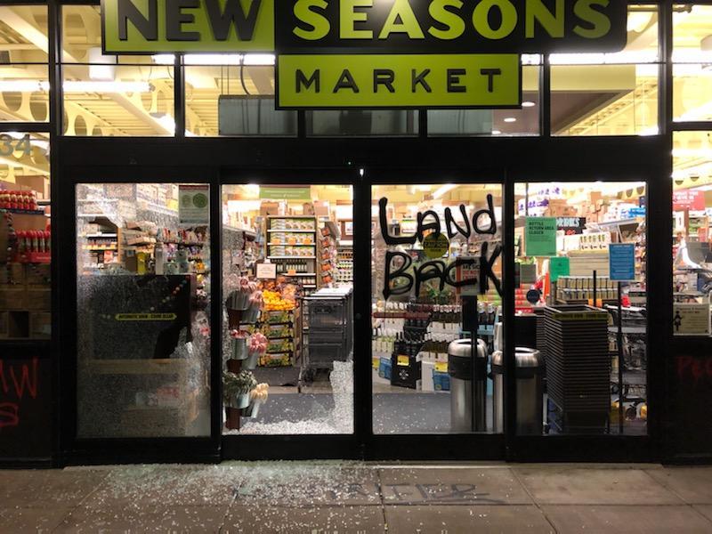 Thanksgiving protesters topple statues and vandalize buildings across US