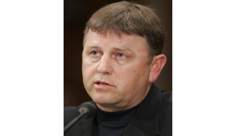 Former CIA analyst, Larry Johnson, testifies on Capitol Hill before a joint Democratic Senate and House committee, Friday, July 22, 2005, in Washington.