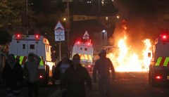 IRA splinter group murders journalist in Londonderry the same day Nancy Pelosi visits