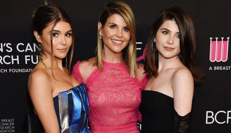 Actress Lori Loughlin, center, poses with daughters Olivia Jade Giannulli, left, and Isabella Rose Giannulli at the 2019 "An Unforgettable Evening" at the Beverly Wilshire Hotel, Thursday, Feb. 28, 2019, in Beverly Hills, Calif. 