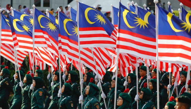 Malaysian court sentences five gay men to jail, caning, and fines