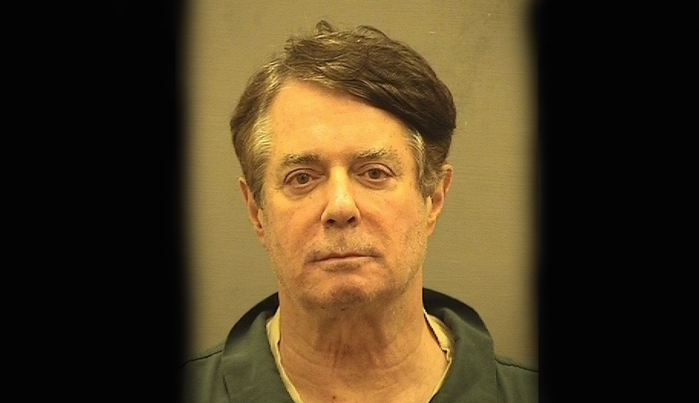Here is Paul Manafort’s mug shot after being booked at new detention center