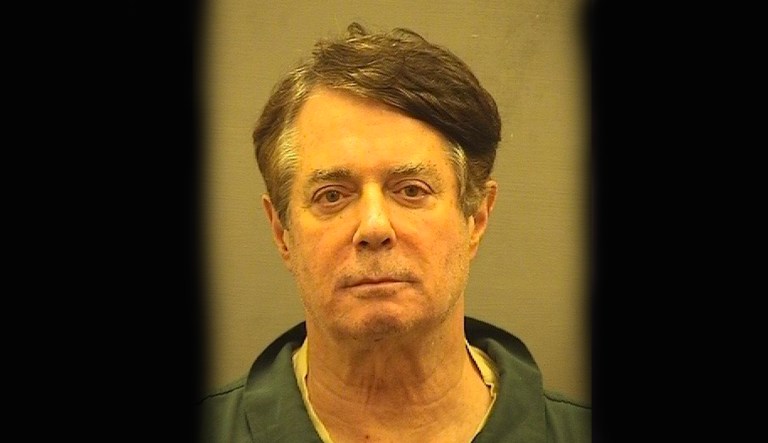 Here is Paul Manafort’s mug shot after being booked at new detention center