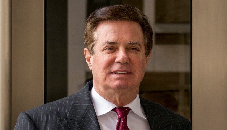 FILE - In this April 4, 2018, file photo, Paul Manafort, President Donald Trump's former campaign chairman, leaves the federal courthouse in Washington. A year into his investigation, special counsel Robert Mueller is everywhere and nowhere at the same time. In that time, the breadth and stealth of his investigation has rattled the White House and its chief occupant, and has spread to Capitol Hill, K Street, foreign governments and, as late as last week, corporate boardrooms.