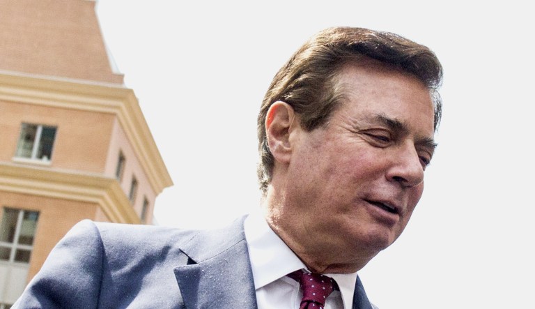 Paul Manafort, President Trump's former campaign chairman, gets into a taxi after arriving at Union Station in Washington.