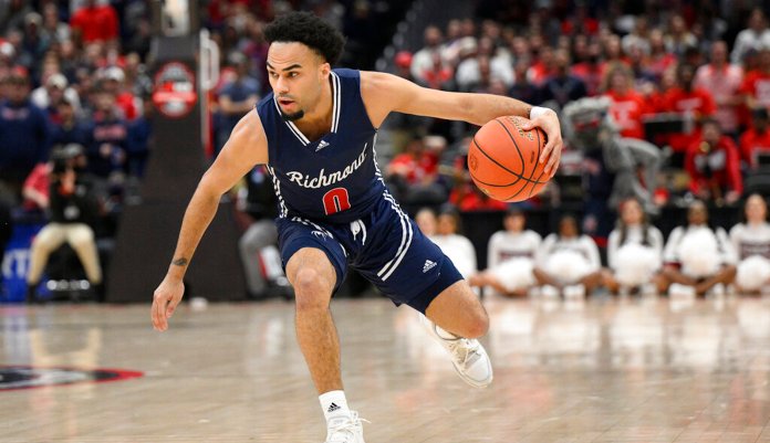 Richmond guard Jacob Gilyard (0) in action during the first half of an NCAA college basketball game in the championship of the Atlantic 10 Conference tournament against Davidson, Sunday, March 13, 2022, in Washington.