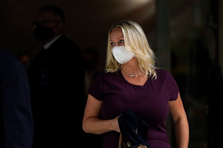 Wife of former California congressman sentenced for corruption