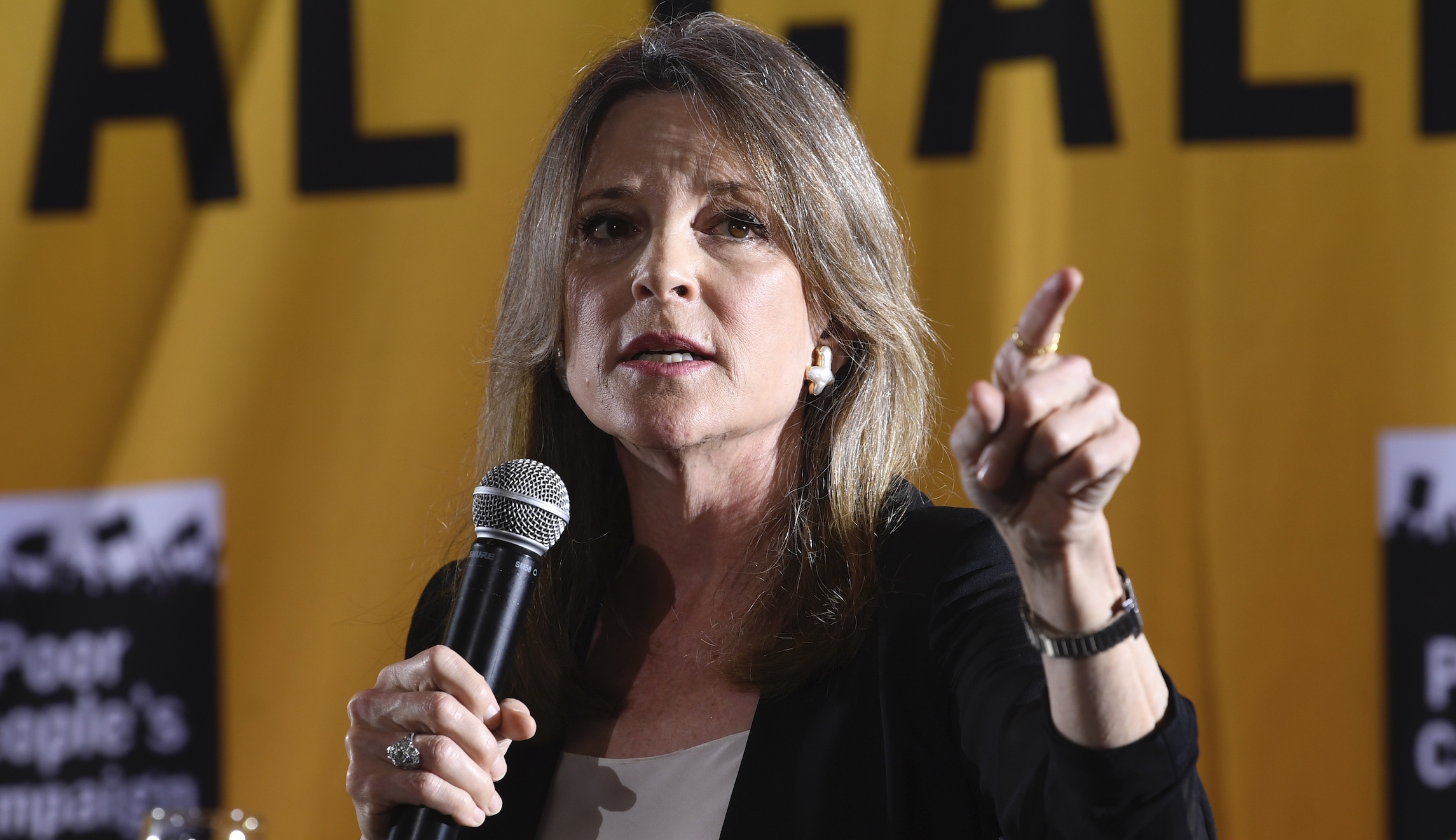 What’s behind the charm of Marianne Williamson?