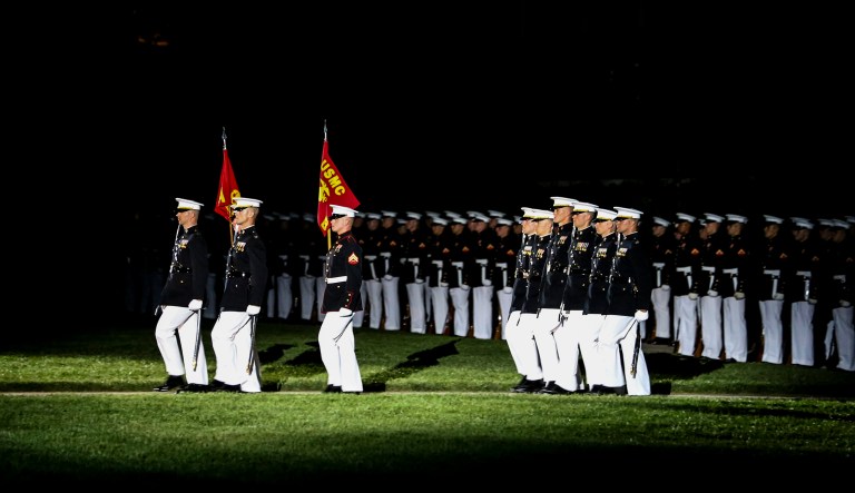 Marine Barracks Washington D.C. officers and company guideon bearers march down Center Walk.