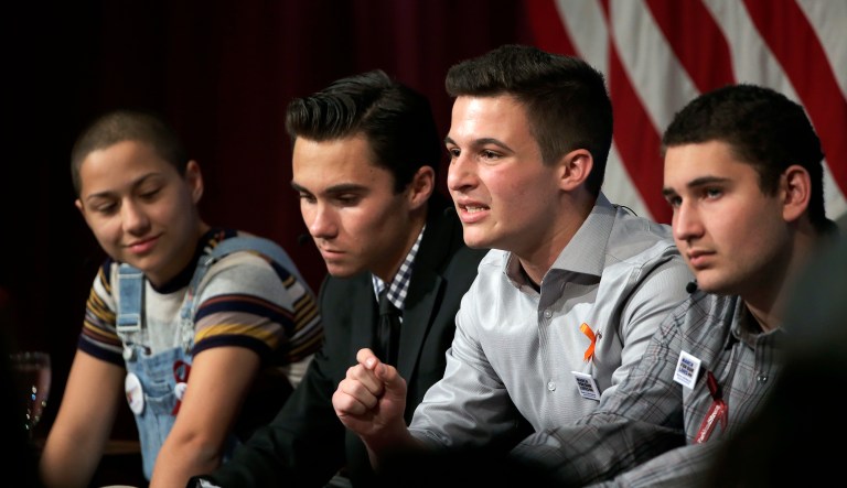 Marjory Stoneman Douglas High School students, and mass shooting survivors, from left, Emma Gonzalez, David Hogg, Cameron Kasky and Alex Wind participate in a panel discussion about guns, Tuesday, March 20, 2018, at Harvard Kennedy School's Institute of Politics, in Cambridge, Mass. The Feb. 14, 2018, attack in Florida killed 17 people, 14 of them students. The students have become vocal advocates for stricter gun laws.