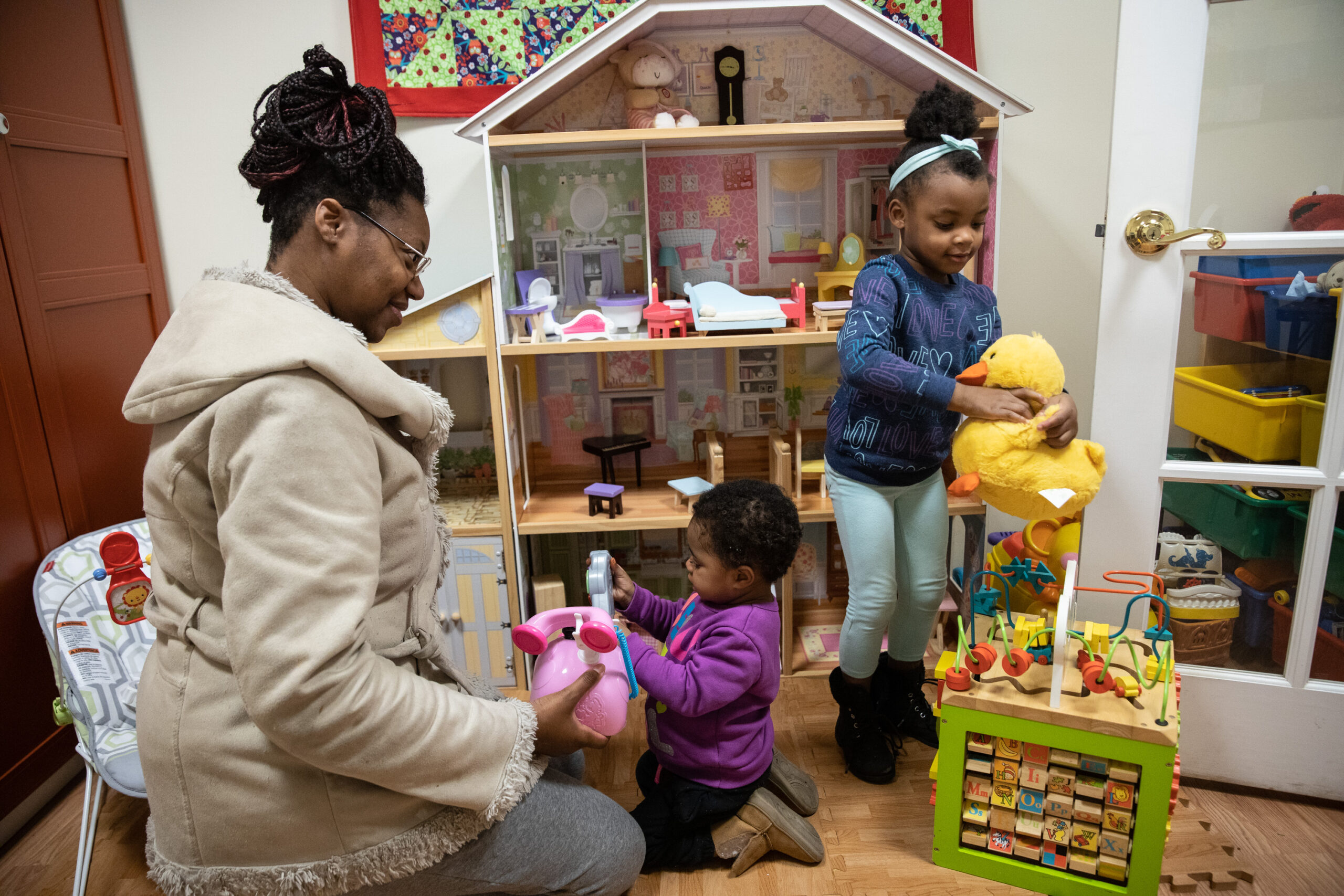 Tara and her children in the playroom at Mary's Shelter
