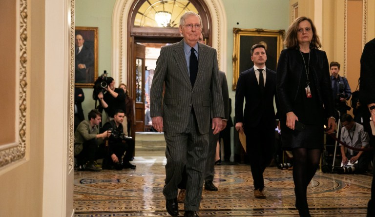 Senate Majority Leader Mitch McConnell enters the Senate chamber before articles of impeachment are delivered from the House on January 15, 2020.
