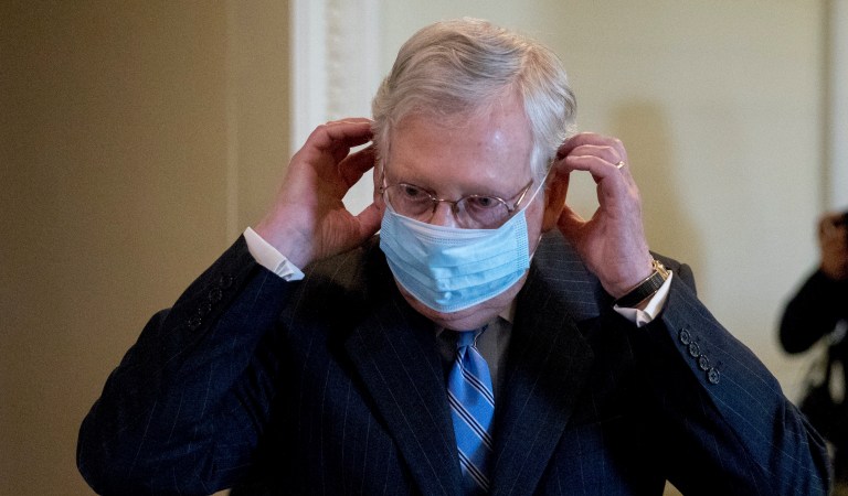 In split with House GOP, McConnell urges mask usage